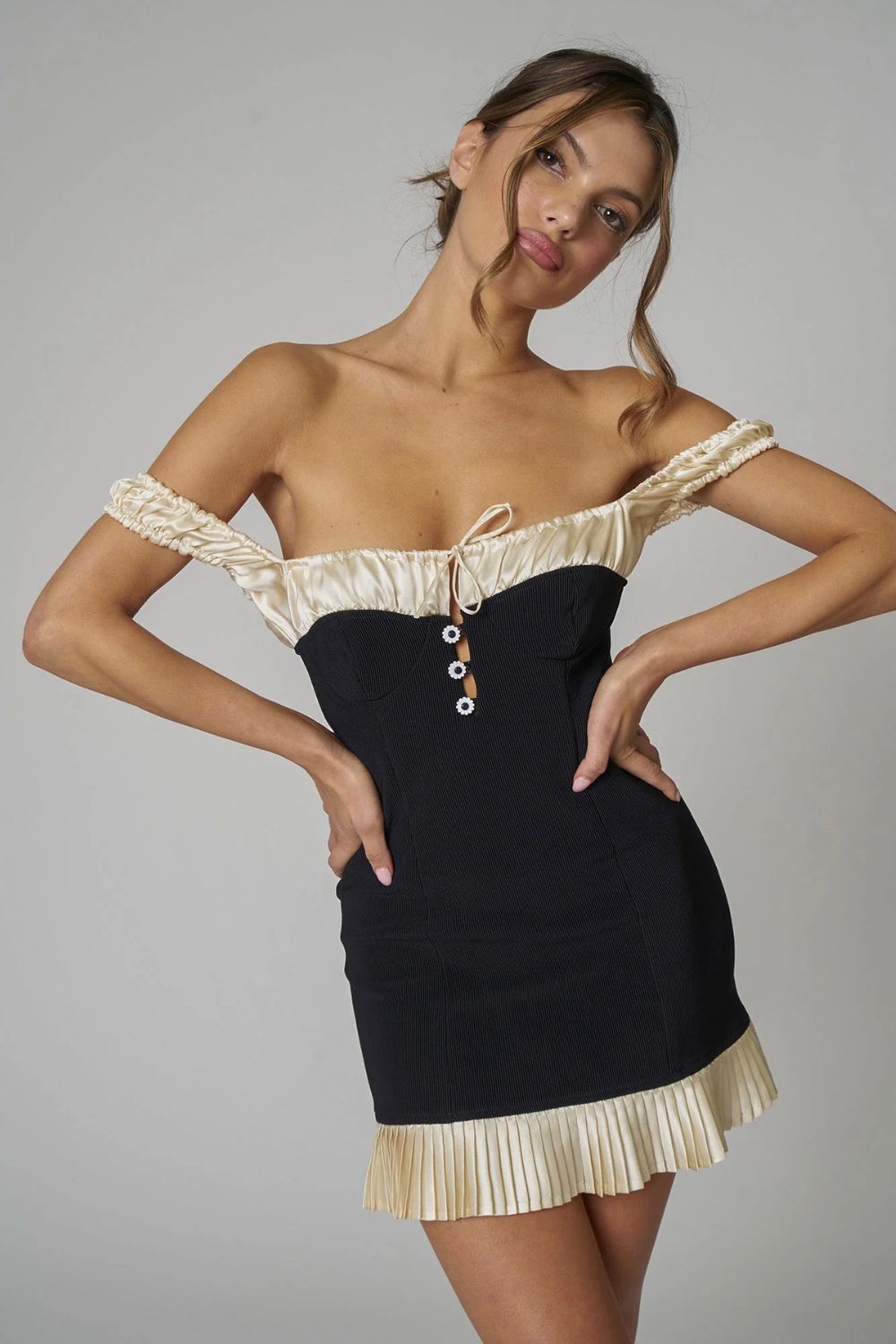 Off-Shoulder Rib Knit Mini Dress in Black with Silk Ruffle Trim